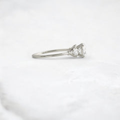 Morning Light, Bloom Petal Round Moissanite Engagement Ring