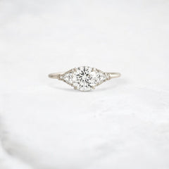 Morning Light, Bloom Petal Round Moissanite Engagement Ring