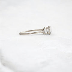 Morning Light, Bloom Petal Round Moissanite Engagement Ring