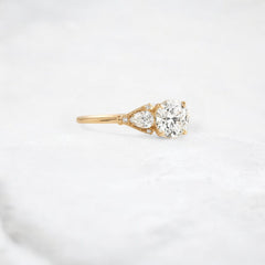 morning-light-bloom-petal-round-moissanite-engagement-ring-0-9-ct-yellow-gold-gemfora-2