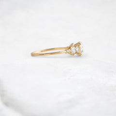 morning-light-bloom-petal-round-moissanite-engagement-ring-0-9-ct-yellow-gold-gemfora-3