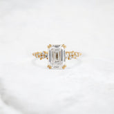 nova-whisper-emerald-cluster-shine-moissanite-engagement-ring-2-ct-yellow-gold-gemfora-1