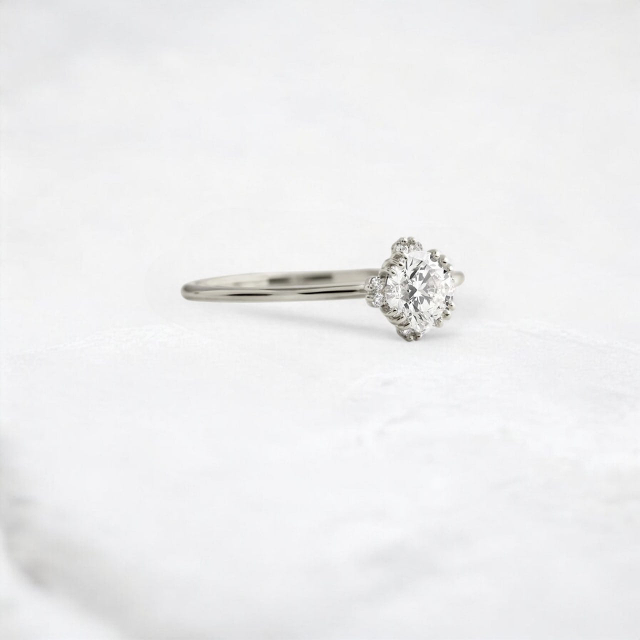 pure-halo-round-brilliant-moissanite-engagement-ring-0-5-ct-platinum-gemfora-2