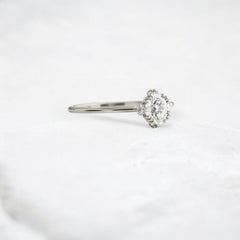 pure-halo-round-brilliant-moissanite-engagement-ring-0-5-ct-platinum-gemfora-2