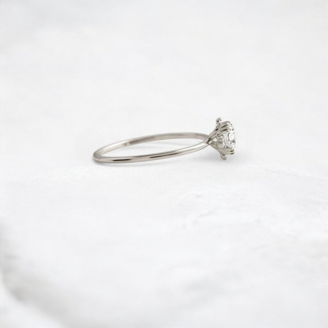 pure-halo-round-brilliant-moissanite-engagement-ring-0-5-ct-platinum-gemfora-3