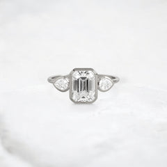 royal-whisper-emerald-bezel-hidden-moissanite-engagement-ring-1-5-ct-platinum-gemfora-1