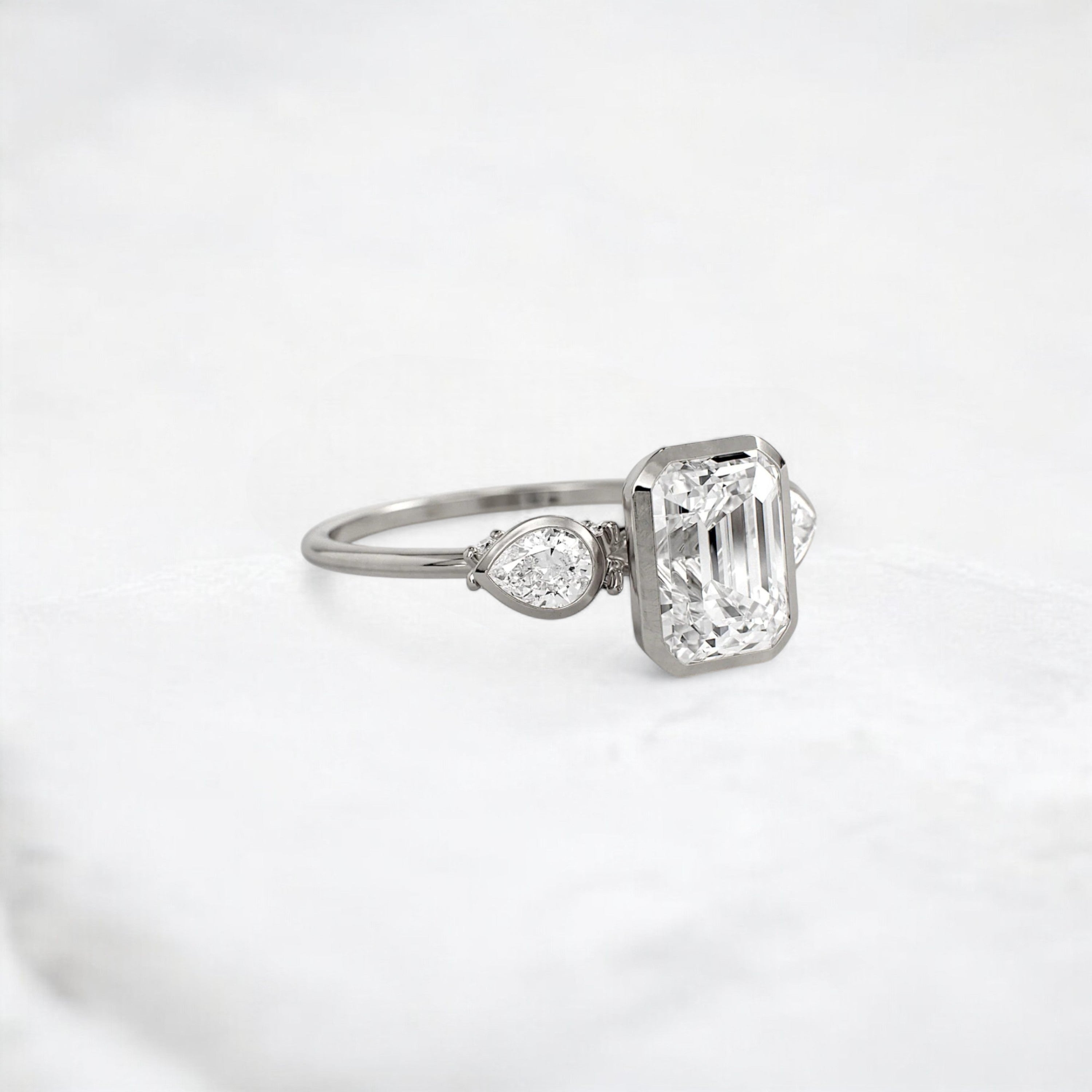 royal-whisper-emerald-bezel-hidden-moissanite-engagement-ring-1-5-ct-platinum-gemfora-2