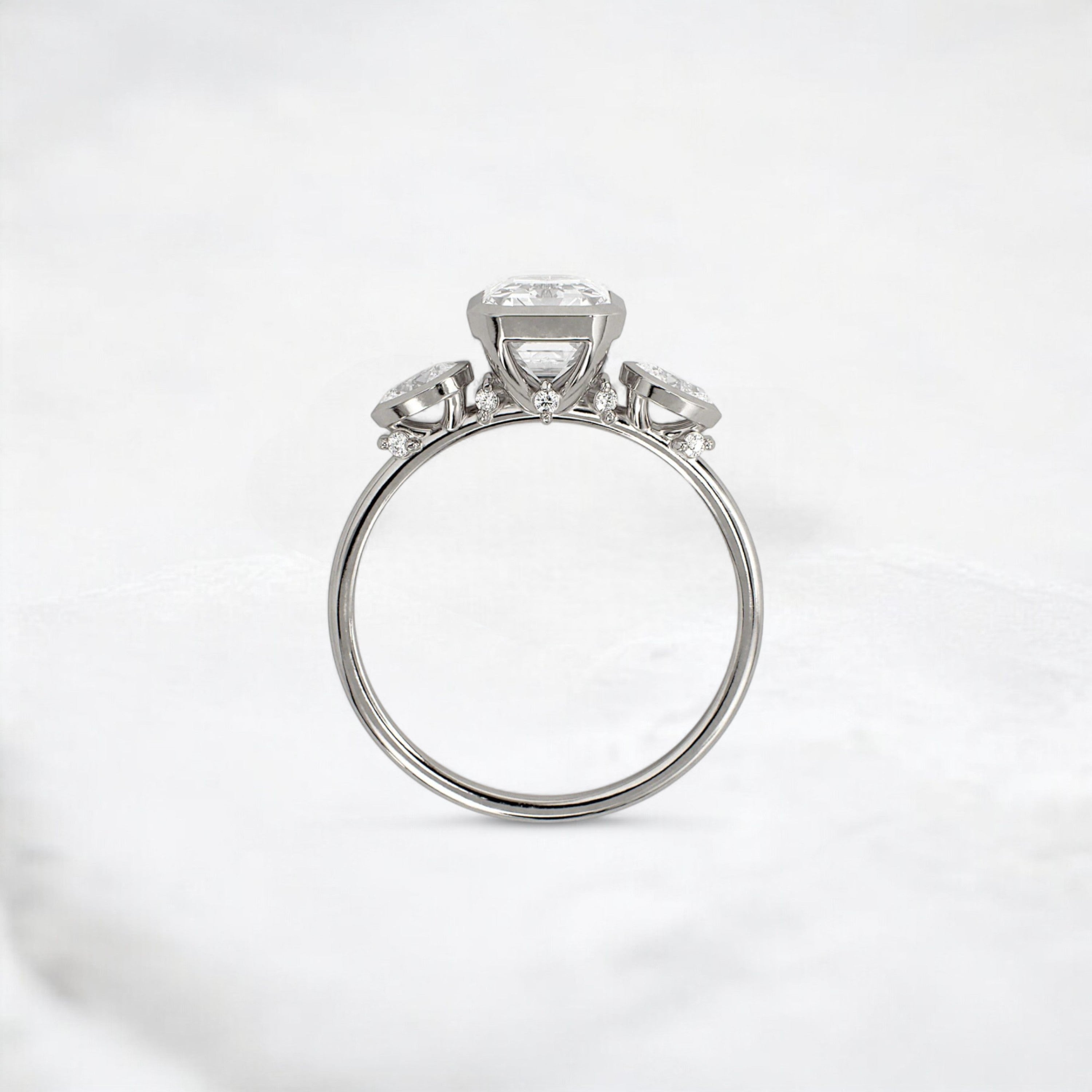 royal-whisper-emerald-bezel-hidden-moissanite-engagement-ring-1-5-ct-platinum-gemfora-4