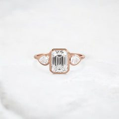 royal-whisper-emerald-bezel-hidden-moissanite-engagement-ring-1-5-ct-rose-gold-gemfora-1