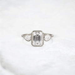 royal-whisper-emerald-bezel-hidden-moissanite-engagement-ring-1-5-ct-white-gold-gemfora-1