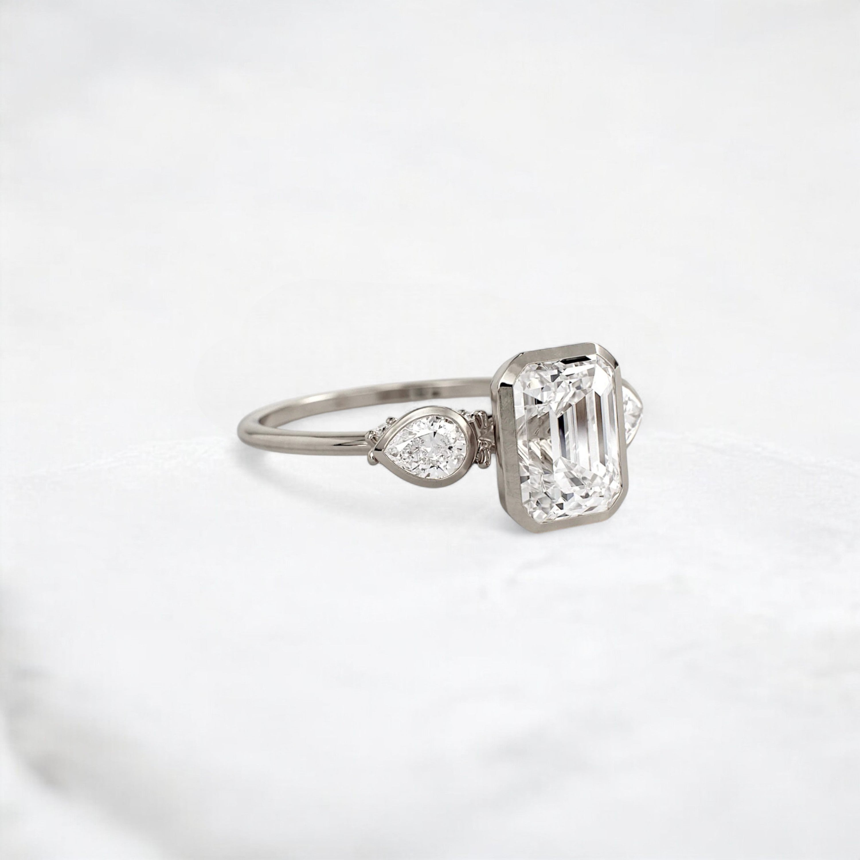 royal-whisper-emerald-bezel-hidden-moissanite-engagement-ring-1-5-ct-white-gold-gemfora-2