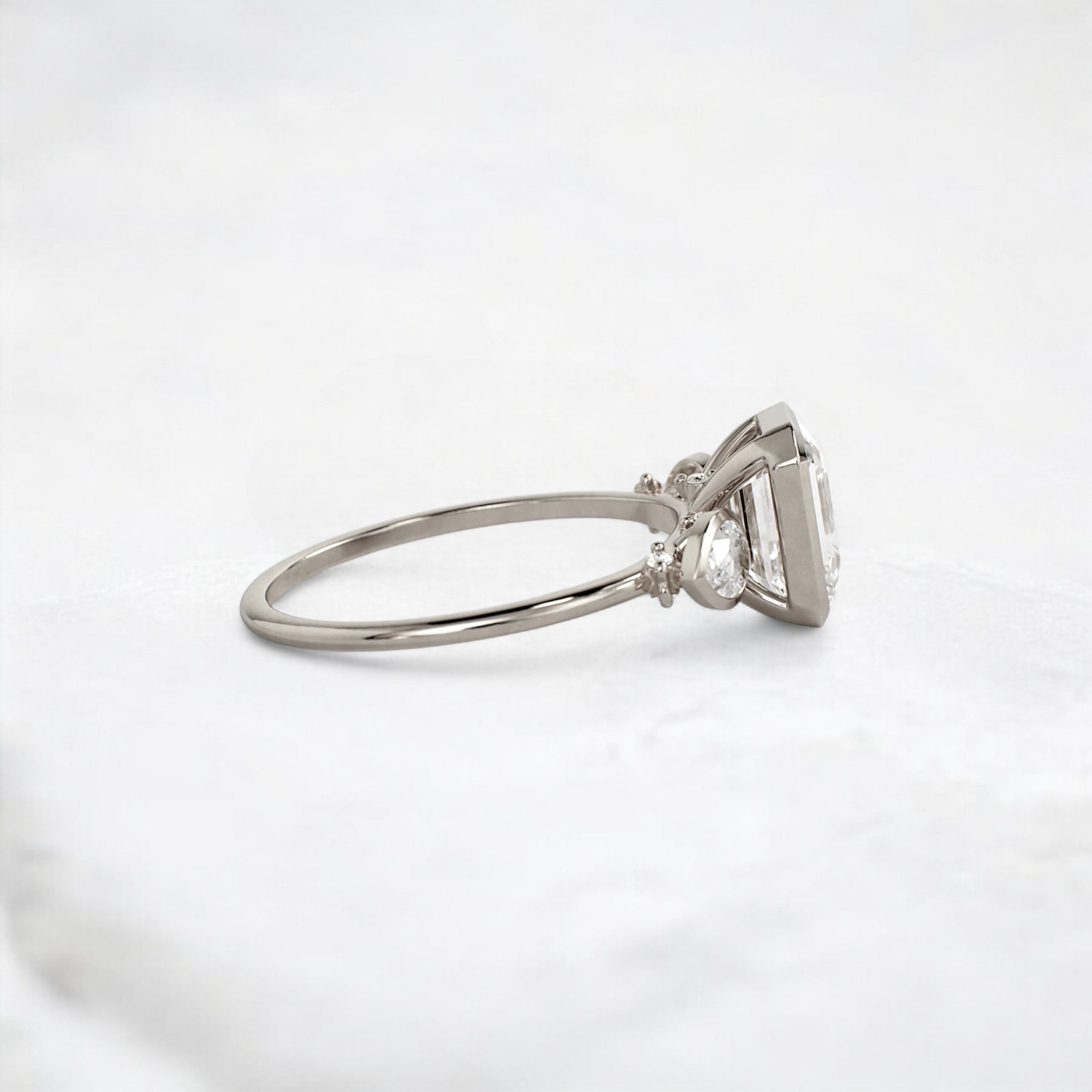 royal-whisper-emerald-bezel-hidden-moissanite-engagement-ring-1-5-ct-white-gold-gemfora-3