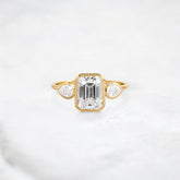 royal-whisper-emerald-bezel-hidden-moissanite-engagement-ring-1-5-ct-yellow-gold-gemfora-1