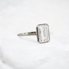 secret-glimmer-emerald-cut-bezel-moissanite-engagement-ring-4-ct-white-gold-gemfora-2