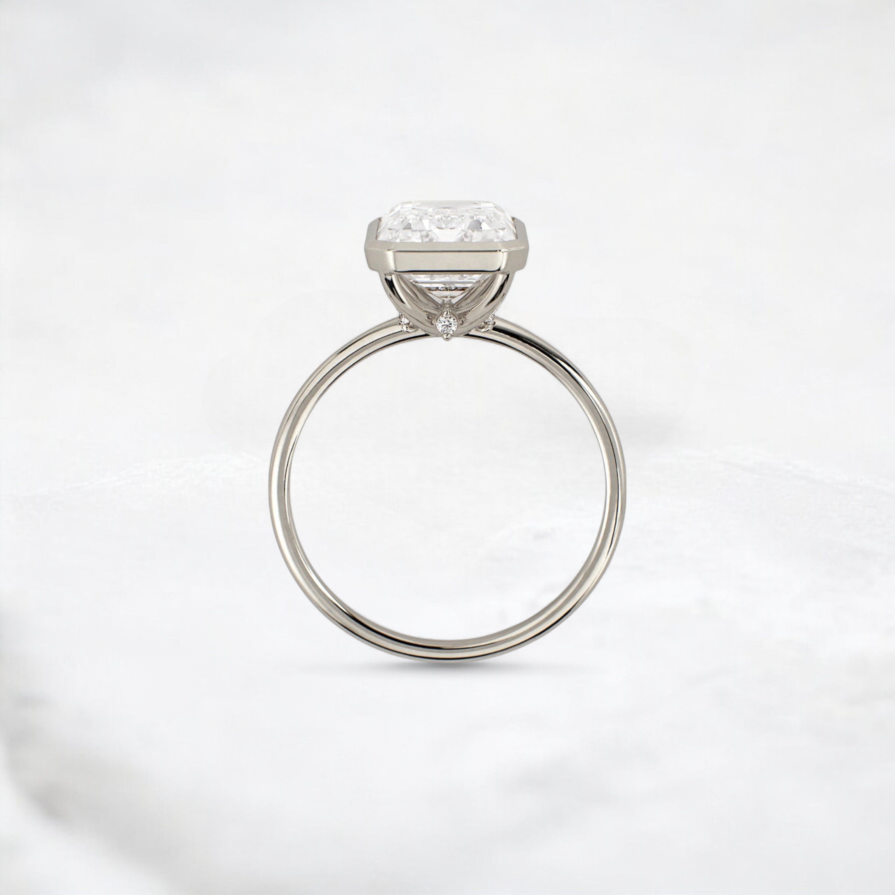 secret-glimmer-emerald-cut-bezel-moissanite-engagement-ring-4-ct-white-gold-gemfora-4