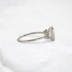silent-luster-emerald-cluster-bezel-moissanite-engagement-ring-1-ct-white-gold-gemfora-3