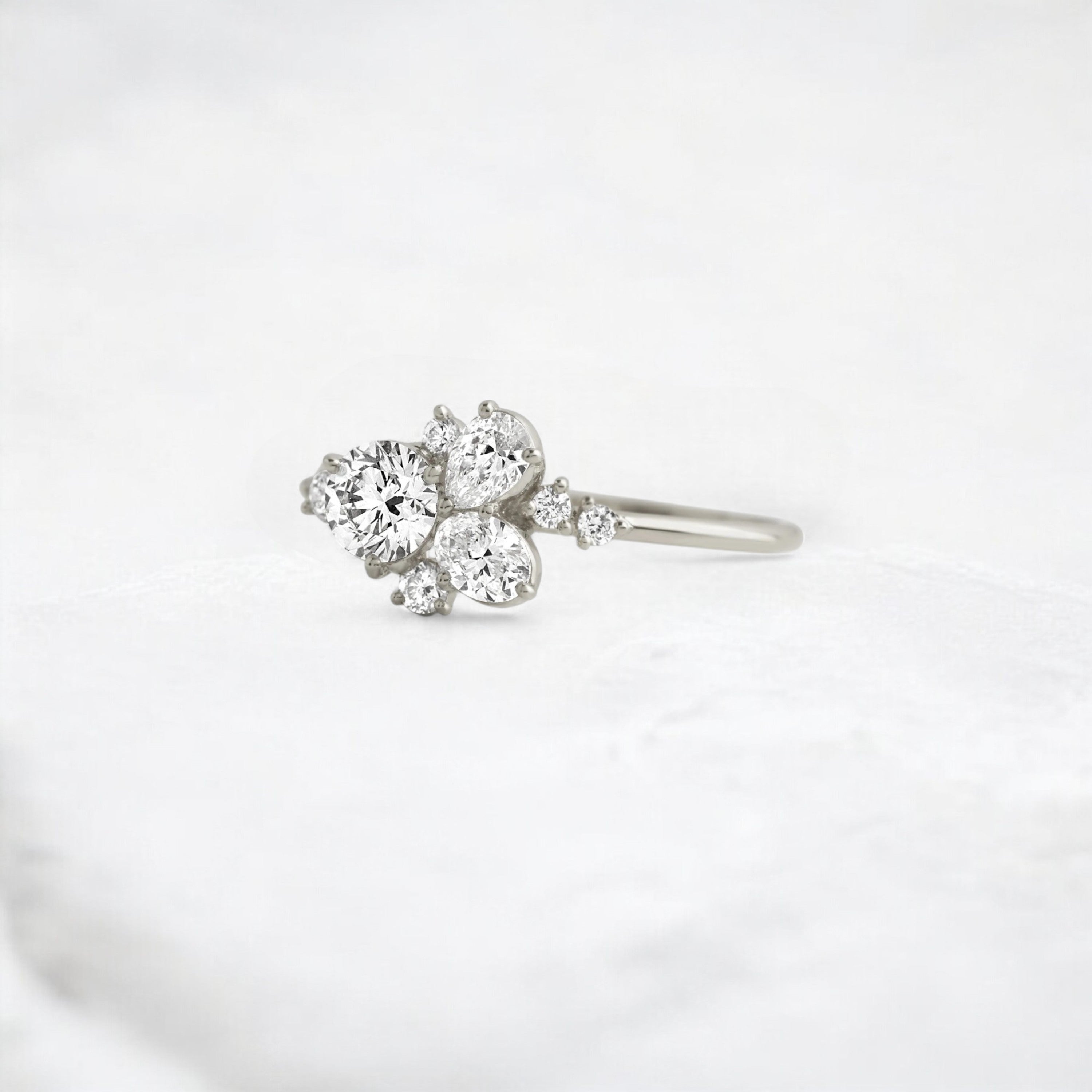 starpetal-whispers-round-cluster-love-engagement-ring-0-30-ct-platinum-gemfora-3