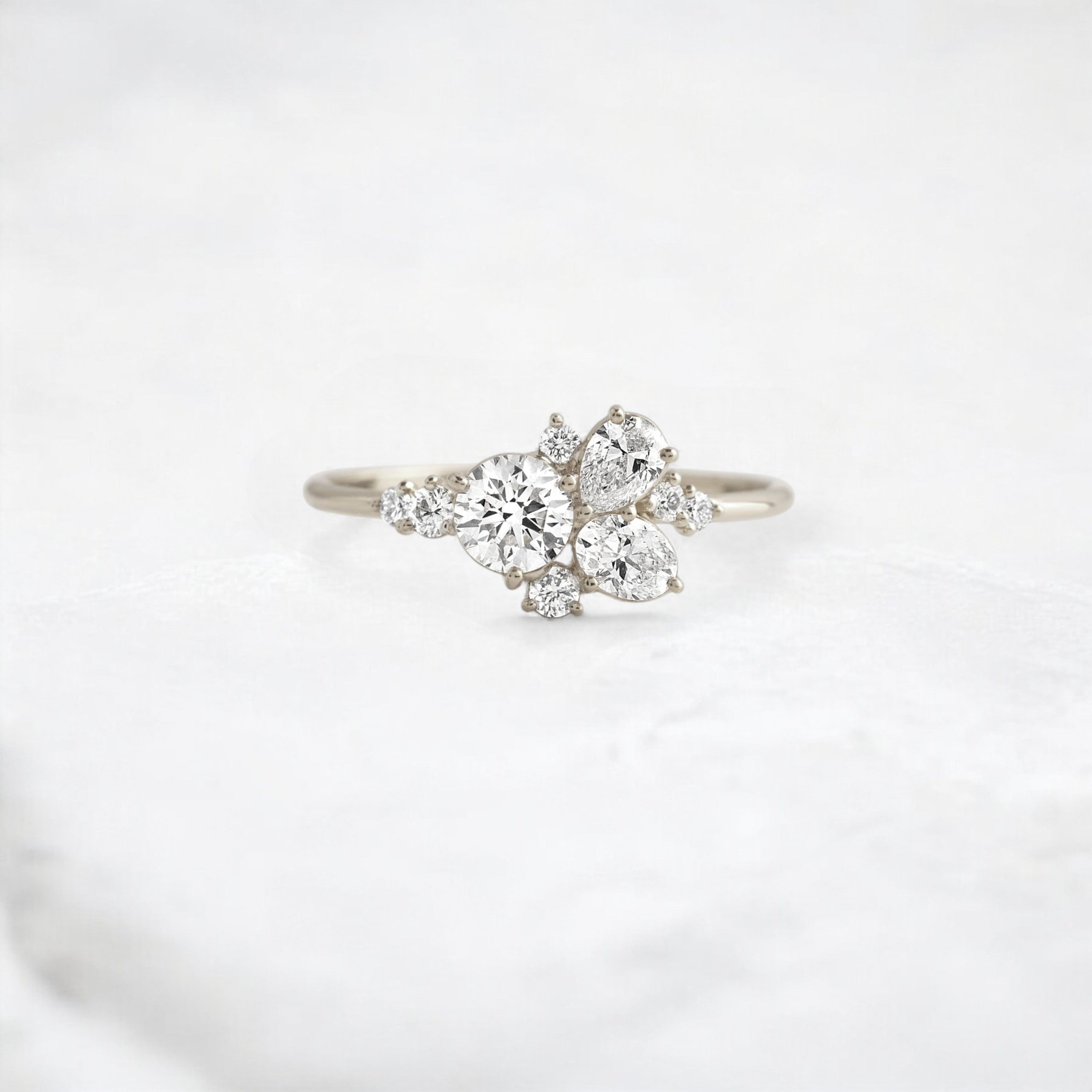 starpetal-whispers-round-cluster-love-engagement-ring-0-30-ct-white-gold-gemfora-1