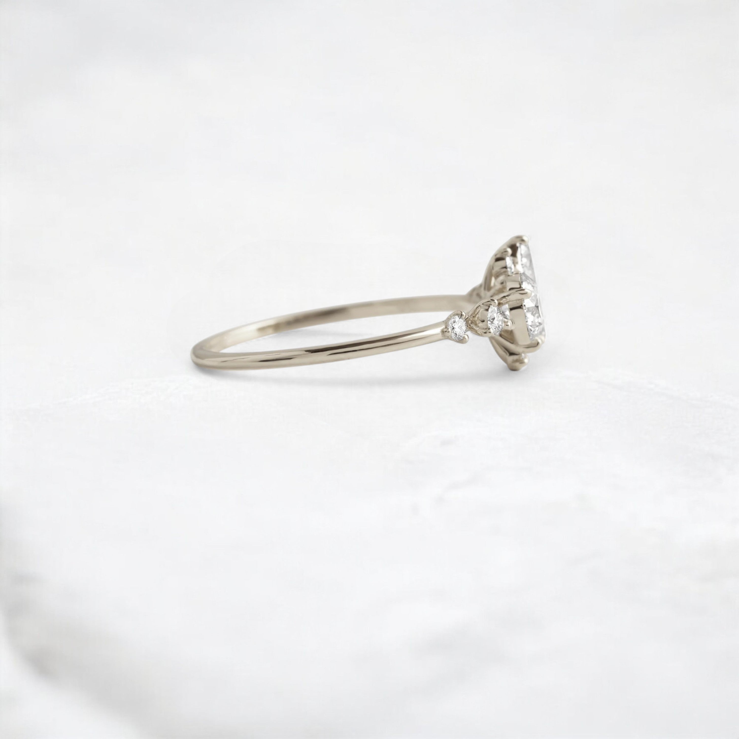 starpetal-whispers-round-cluster-love-engagement-ring-0-30-ct-white-gold-gemfora-4