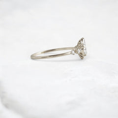 starpetal-whispers-round-cluster-love-engagement-ring-0-30-ct-white-gold-gemfora-4