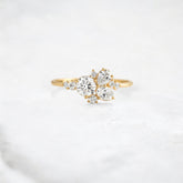 starpetal-whispers-round-cluster-love-engagement-ring-0-30-ct-yellow-gold-gemfora-1
