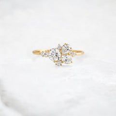 starpetal-whispers-round-cluster-love-engagement-ring-0-30-ct-yellow-gold-gemfora-1