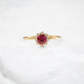 sunset-spark-round-ruby-radiance-halo-engagement-ring-0-50-ct-yellow-gold-gemfora-1