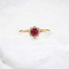 sunset-spark-round-ruby-radiance-halo-engagement-ring-0-50-ct-yellow-gold-gemfora-1