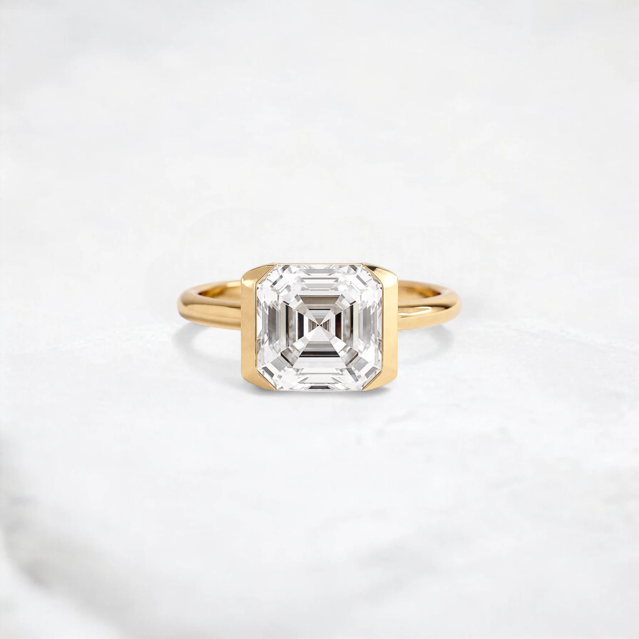 the-radiance-asscher-cut-2.5ct-engagement-ring-with-half-bezel-1