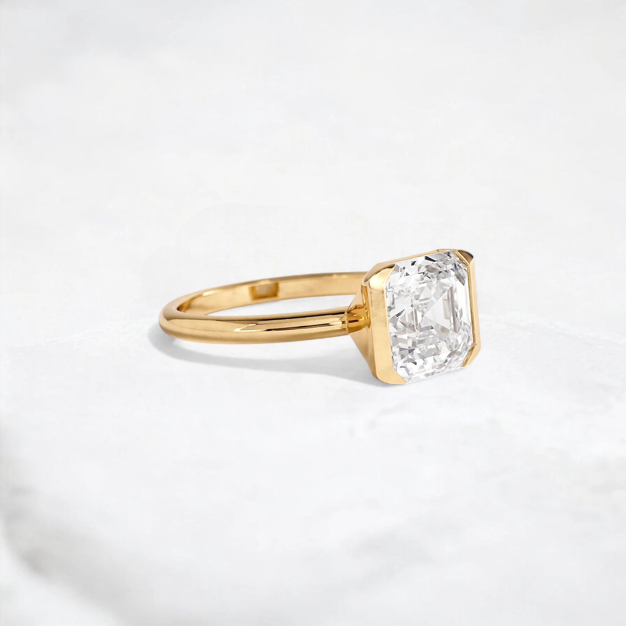 the-radiance-asscher-cut-2.5ct-engagement-ring-with-half-bezel-3