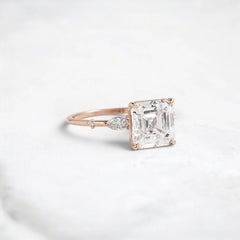 Three Stone 3.0CT Asscher Cut Moissanite Accented Two Marquise And Eight Round Four Prong