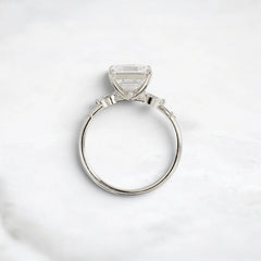 Three Stone 3.0CT Asscher Cut Moissanite Accented Two Marquise And Eight Round Four Prong