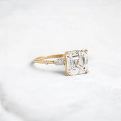 Three Stone 3.0CT Asscher Cut Moissanite Accented Two Marquise And Eight Round Four Prong