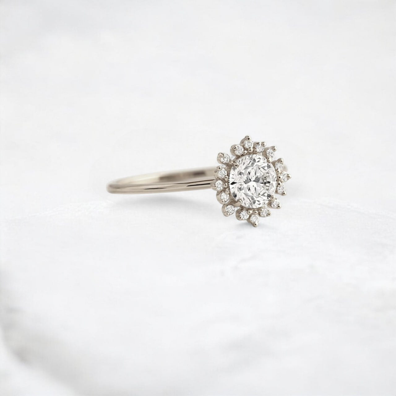 twilight-spark-radiant-round-moissanite-engagement-halo-ring-0-7-ct-white-gold-gemfora-2