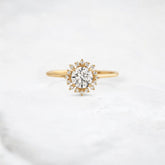twilight-spark-radiant-round-moissanite-engagement-halo-ring-0-7-ct-yellow-gold-gemfora-1