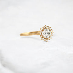 twilight-spark-radiant-round-moissanite-engagement-halo-ring-0-7-ct-yellow-gold-gemfora-2