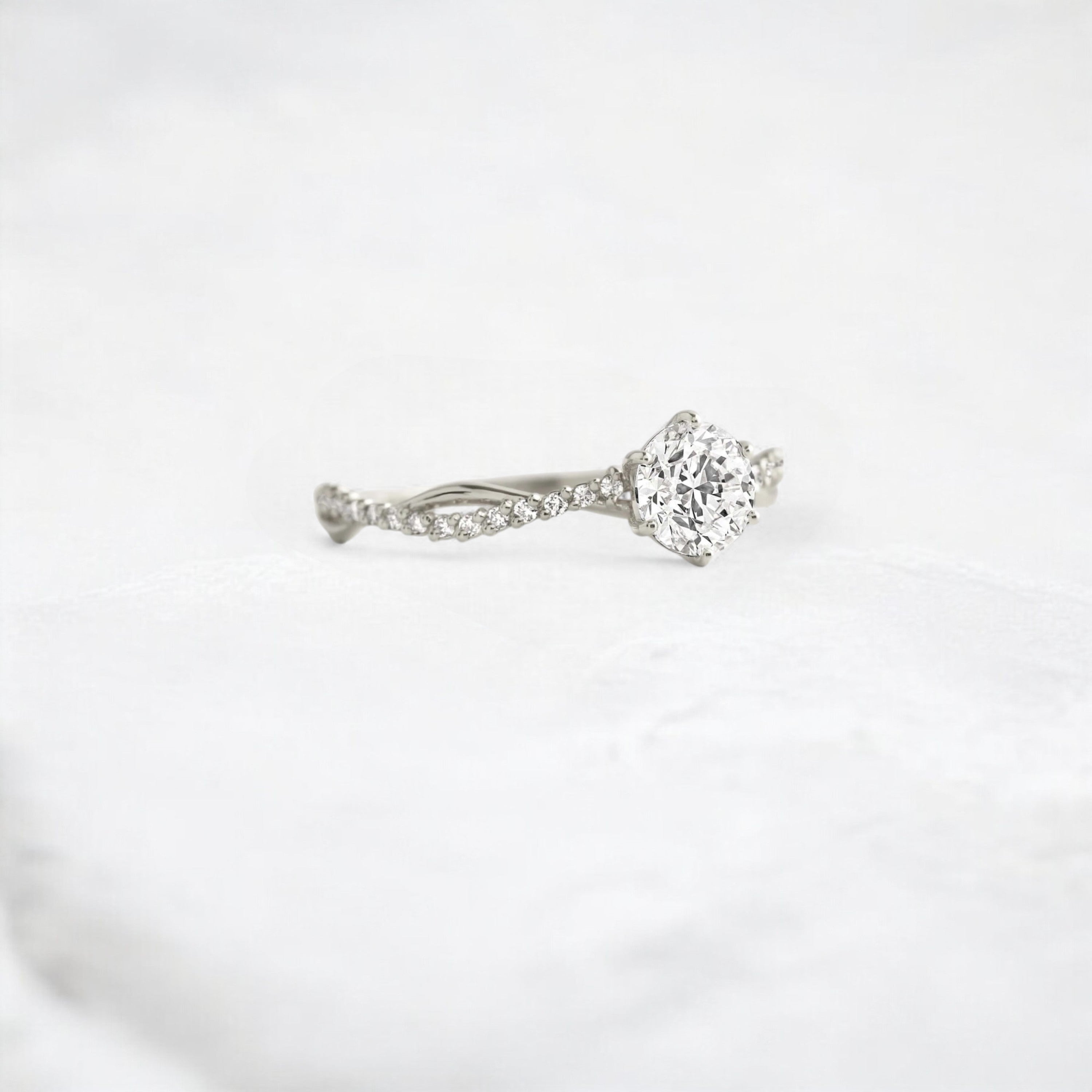 twist-of-love-round-cut-moissanite-pave-engagement-ring-0-70-ct-platinum-gemfora-2