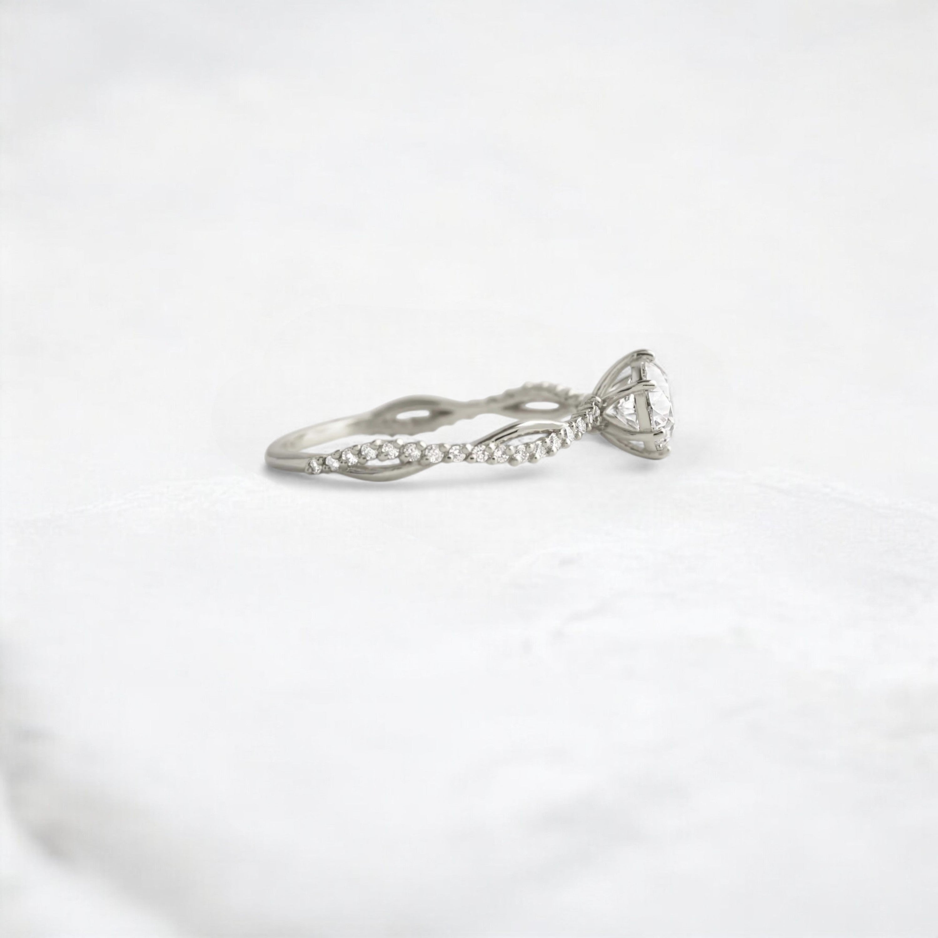 twist-of-love-round-cut-moissanite-pave-engagement-ring-0-70-ct-platinum-gemfora-3