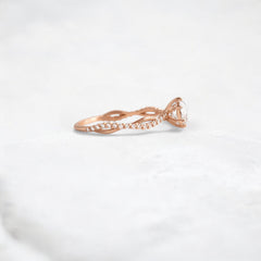 twist-of-love-round-cut-moissanite-pave-engagement-ring-0-70-ct-rose-gold-gemfora-3