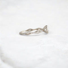 twist-of-love-round-cut-moissanite-pave-engagement-ring-0-70-ct-white-gold-gemfora-3