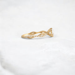 twist-of-love-round-cut-moissanite-pave-engagement-ring-0-70-ct-yellow-gold-gemfora-3