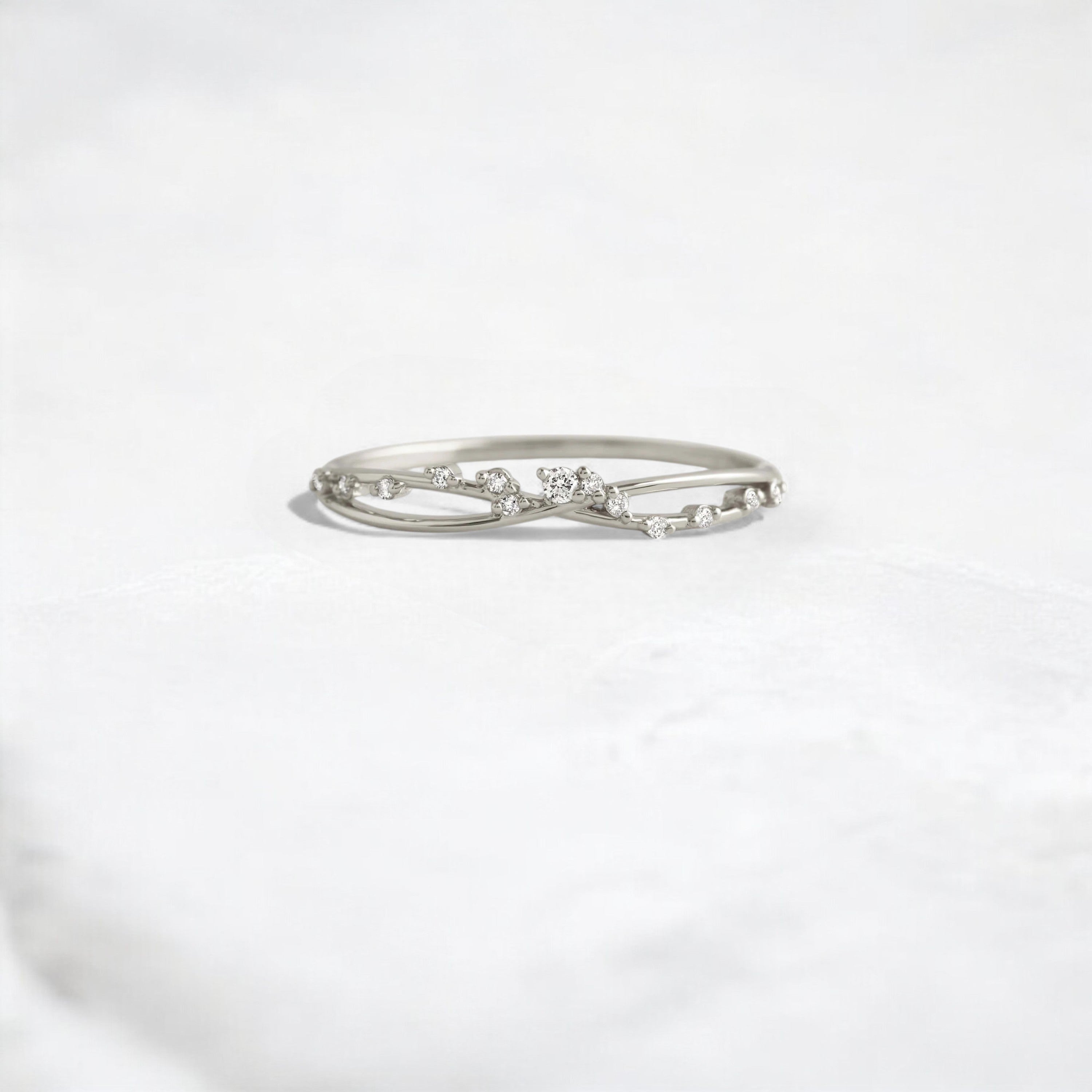 unity-shine-round-criss-cross-women_s-pave-wedding-band-ring-platinum-gemfora-1
