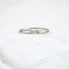 unity-shine-round-criss-cross-women_s-pave-wedding-band-ring-platinum-gemfora-1