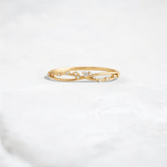 unity-shine-round-criss-cross-women_s-pave-wedding-band-ring-yellow-gold-gemfora-1