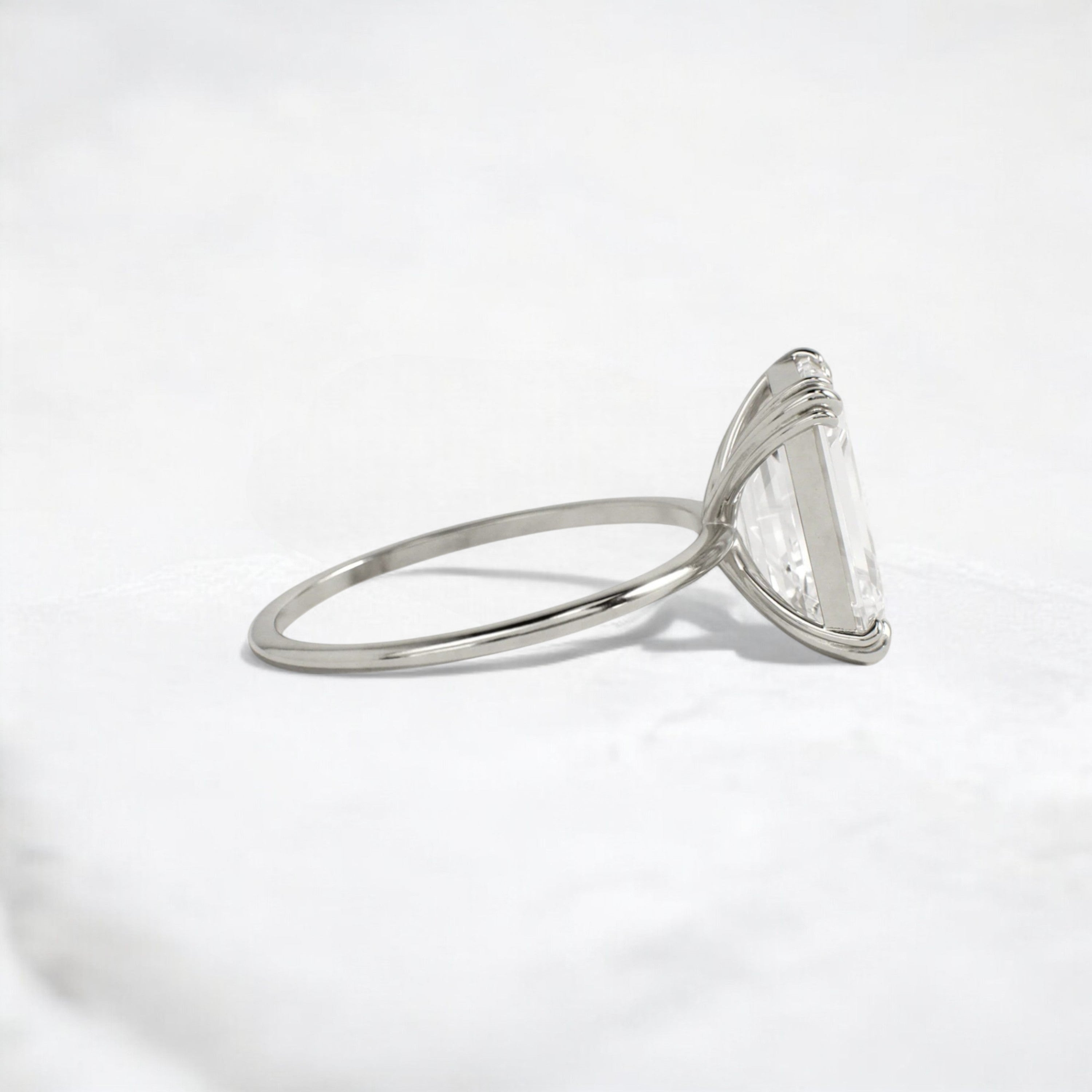 whispered-grace-emerald-moissanite-engagement-promise-ring-4-platinum-gemfora-3