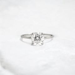 whispering-aurora-round-v-embrace-solitaire-engagement-ring-2-ct-platinum-gemfora-1