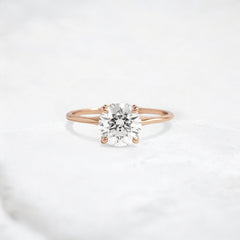 whispering-aurora-round-v-embrace-solitaire-engagement-ring-2-ct-rose-gold-gemfora-1