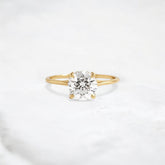 whispering-aurora-round-v-embrace-solitaire-engagement-ring-2-ct-yellow-gold-gemfora-1