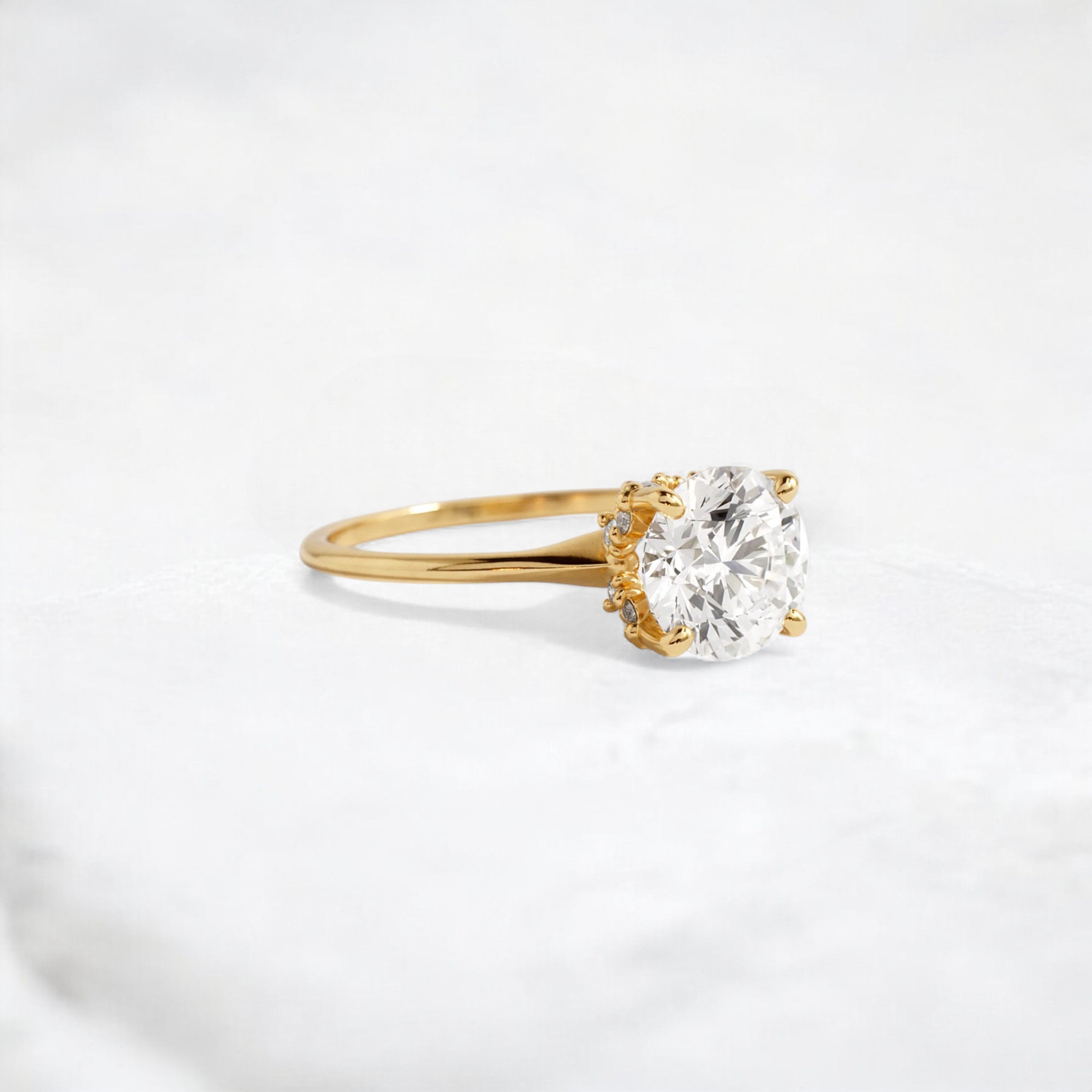 whispering-aurora-round-v-embrace-solitaire-engagement-ring-2-ct-yellow-gold-gemfora-2