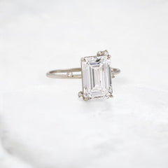 white-flameleaf-petals-emerald-moissanite-engagement-ring-4-25-ct-white-gold-gemfora-2